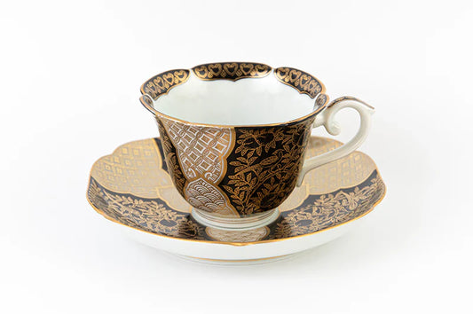Teacup and plate with peach-patterned gold brocade (black)