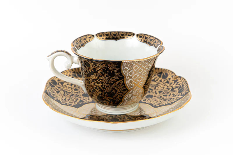 Teacup and plate with peach-patterned gold brocade (black)