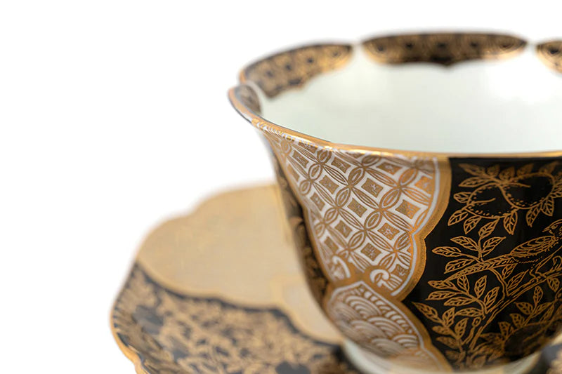 Teacup and plate with peach-patterned gold brocade (black)